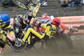 Speedway bike clears safety fence into crowd 