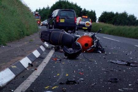 Three police officers charged with dangerous driving after motorcycle crash