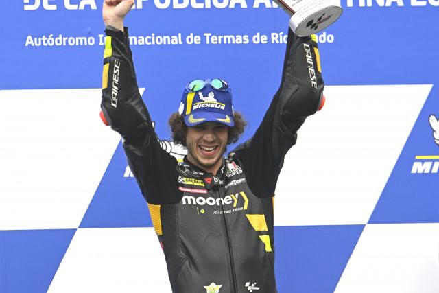 Marco Bezzecchi, 2023 MotoGP Argentinian Grand Prix podium. - Gold and Goose
