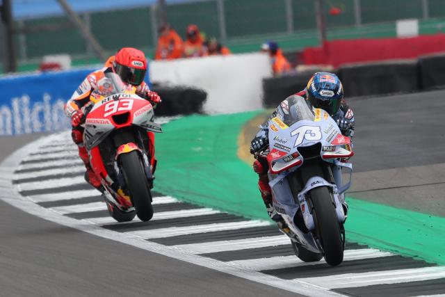 Alex Marquez leads Marc Marquez, 2023 MotoGP British Grand Prix. - Gold and goose