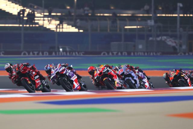 Francesco Bagnaia leads MotoGP pack, 2023 MotoGP Qatar Grand Prix. - Gold and Goose