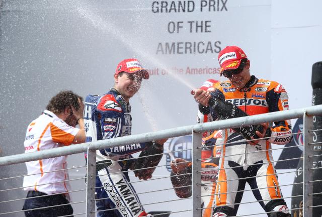 Marc Marquez, Jorge Lorenzo, 2013 MotoGP Grand Prix of the Americas podium. - Gold and Goose