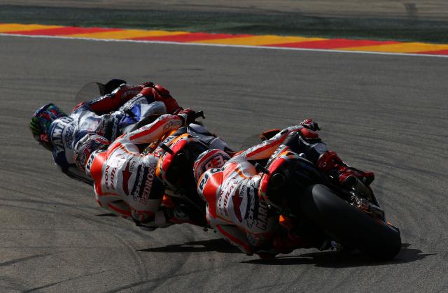 Jorge Lorenzo leads Marc Marquez and Dani Pedrosa, 2013 MotoGP Aragon Grand Prix. - Gold and Goose