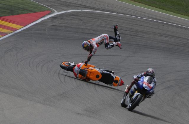 Dani Pedrosa crashes behind Jorge Lorenzo, 2013 MotoGP Aragon Grand Prix. - Gold and Goose