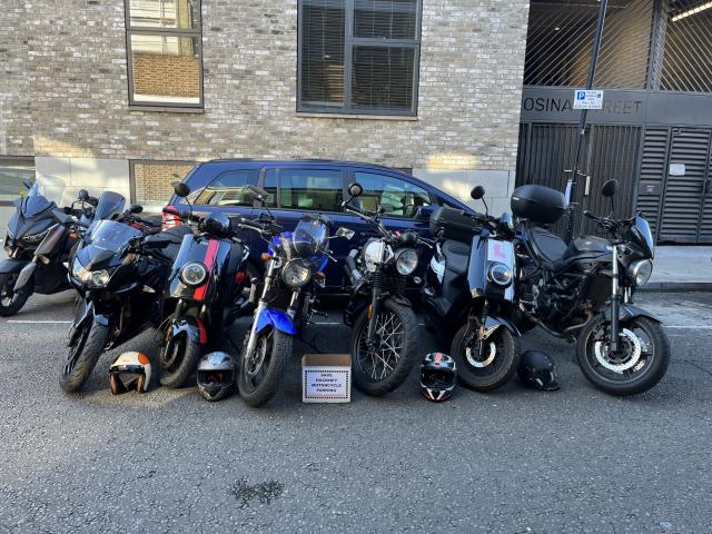 Several motorcycles parked int eh same space as one car. - Save London Motorcycling