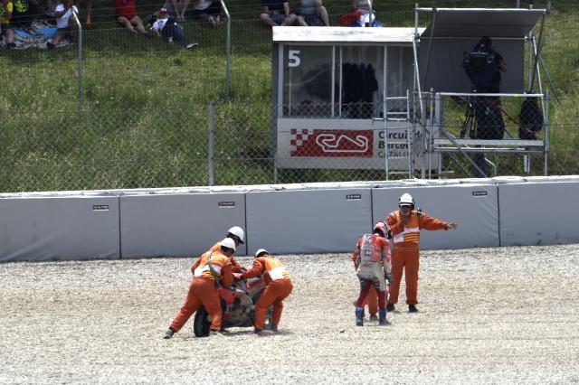 Andrea Dovizioso post-crash in 2018 Catalan Grand Prix. - Gold and Goose.