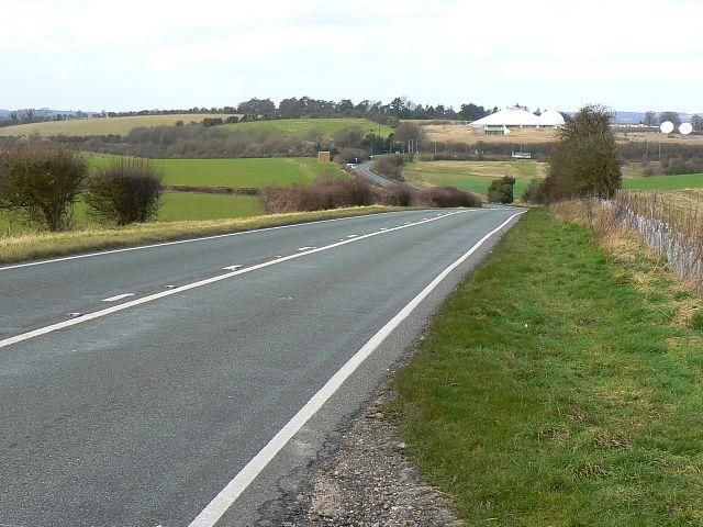 A272 passes between fields. - Sabre Roads