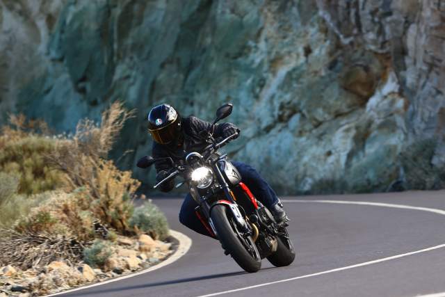 Triumph Trident cornering on a mountain road