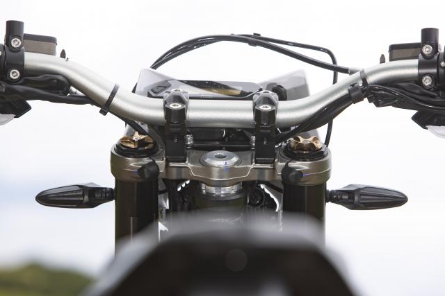 The dash and handlebars on a dirt bike