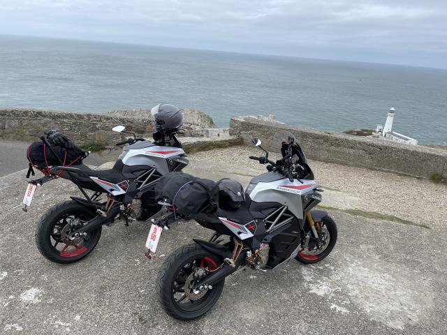 Two electric motorcycles at South Stack Lighthouse Anglesey