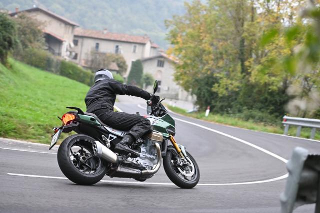 rear shot riding moto guzzi v100 mandello
