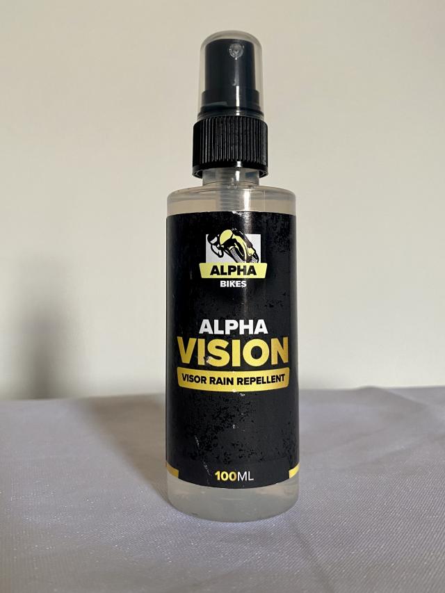 Small spray bottle of Alpha Vision. A water-repellant for visors.