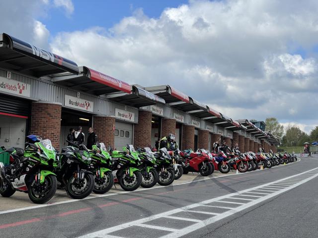 motorcycles in pit lane paddock