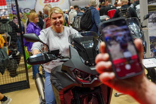 A visitor to Motorcycle Live sitting on a Honda Africa Twin