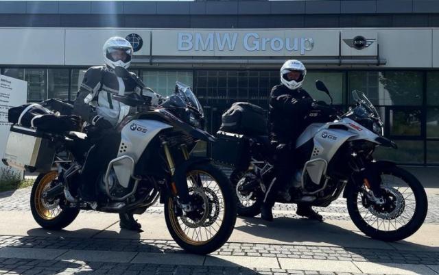 Neale Bayly and Kiran Ridley on the BMW motorbikes they will ride into Ukraine on