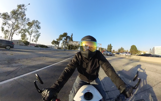 A motorcyclists riding along the freeway in LA