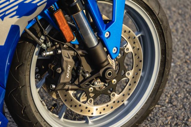 The front brake and suspension of a motorcycle