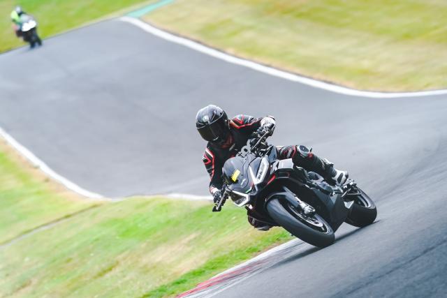 Heading into Park corner at Cadwell park on a motorcycle
