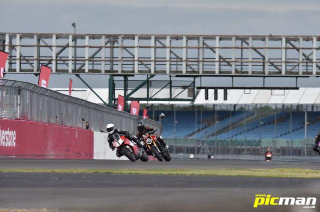 A motorcycle approaches Copse corner at Silverstone