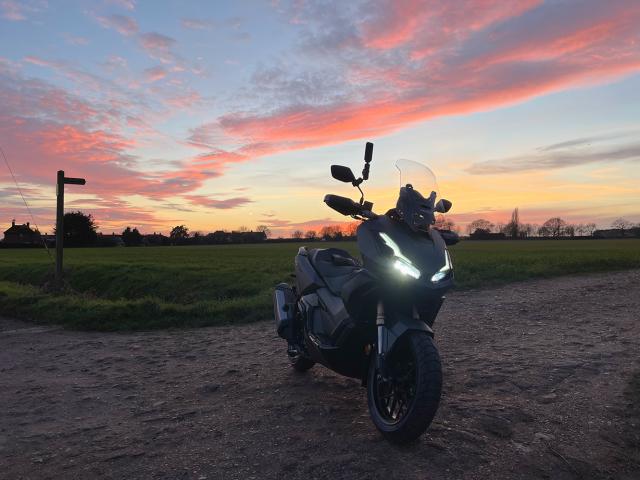 scooter sunset
