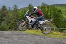 A 790 Adventure motorcycle jumping through the air