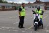 a new rider taking their CBT on an electric motorcycle