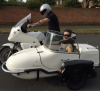 A motorcycle and sidecar combination