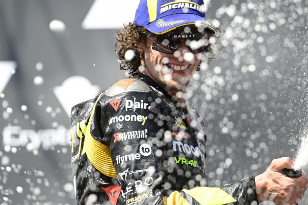 Marco Bezzecchi, 2023 MotoGP Austrian Grand Prix podium. - Gold and Goose