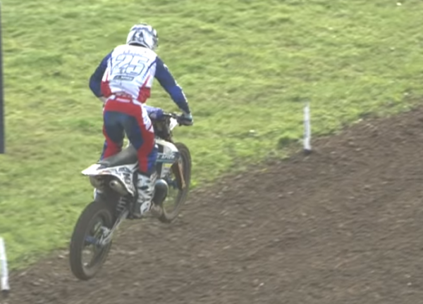 Motocross rider snaps his bike in two with a heavy landing