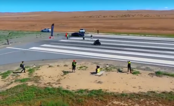 This is what happens when a car drag races a bike!