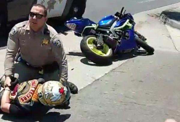 American cop wipes out rider during pursuit