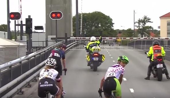 Motorcycle cop comes a cropper during cycle race