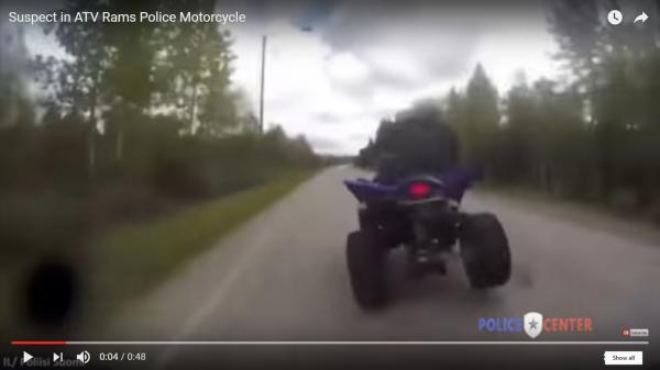 Video: Quad bike rams bike cop