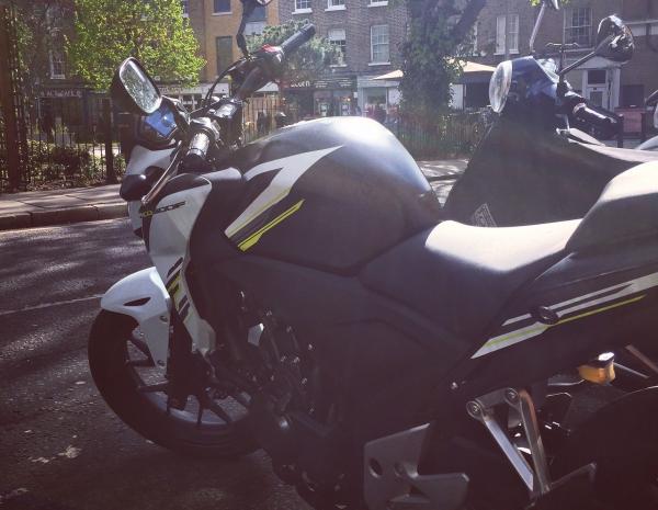 A motorcycle parked on the roadside in London