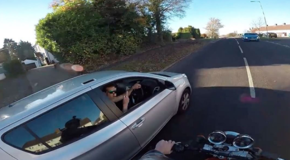Watch: Rider attempts to return driver's wallet but instead gets flipped the bird