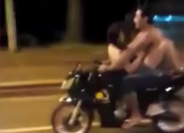 Couple filmed having sex whilst riding a motorcycle