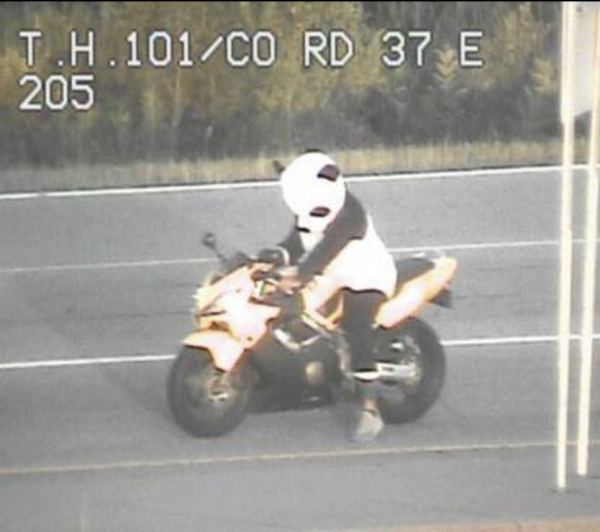 Police pull over motorbike-riding panda