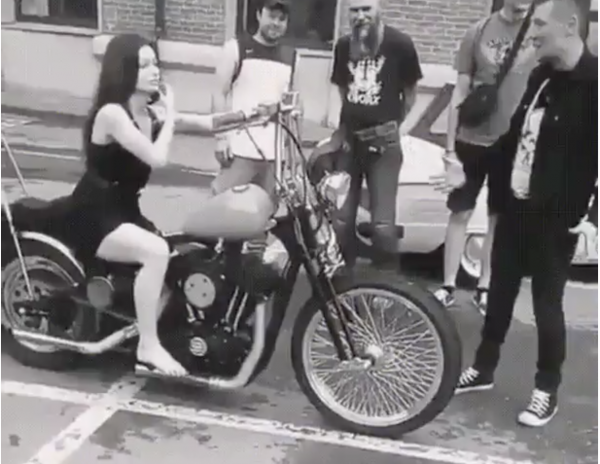 Girl tries to ride motorcycle in a dress... Goes horribly wrong