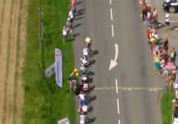 Cyclists crash into course motorcycle during race