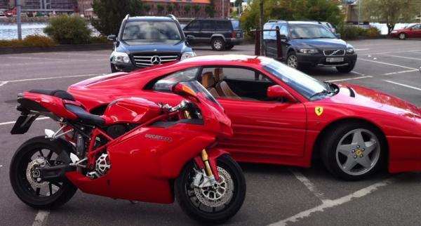 Ducati motorcycle and Ferrari sportscar