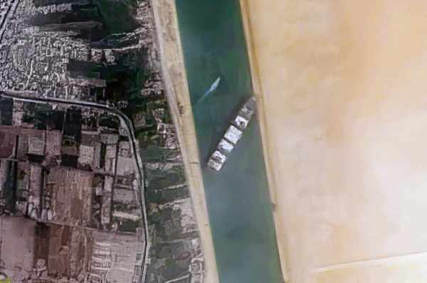 By Contains modified Copernicus Sentinel data [2021], processed by Pierre Markuse - Container Ship &amp;#039;Ever Given&amp;#039; stuck in the Suez Canal, Egypt - March 24th, 2021, CC BY 2.0, 