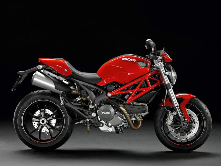 A red and black 2012 Ducati Monster 796 in a studio