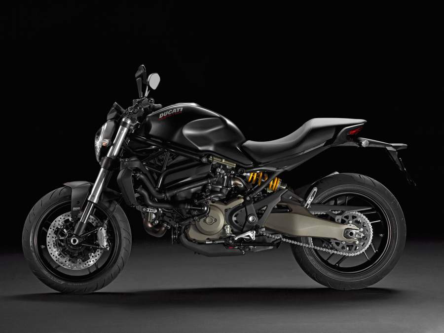 A black 2016 Ducati Monster 821 Dark in a studio