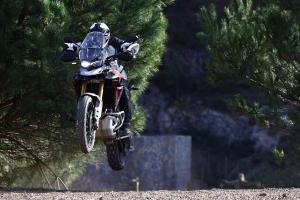 A motorcycle jumping through the air