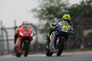 Valentino Rossi leads Casey Stoner, 2007 MotoGP French Grand Prix. - Gold and Goose