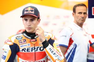 Alberto Puig looks at Marc Marquez in Repsol Honda garage, 2022 Italian Grand Prix. - Gold and Goose