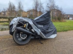 A motorbike partially covered