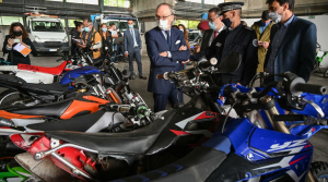 French officials looking at seized motorcycles. - France24